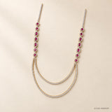 Pink and white stone long necklace laid flat on a soft beige background, full view