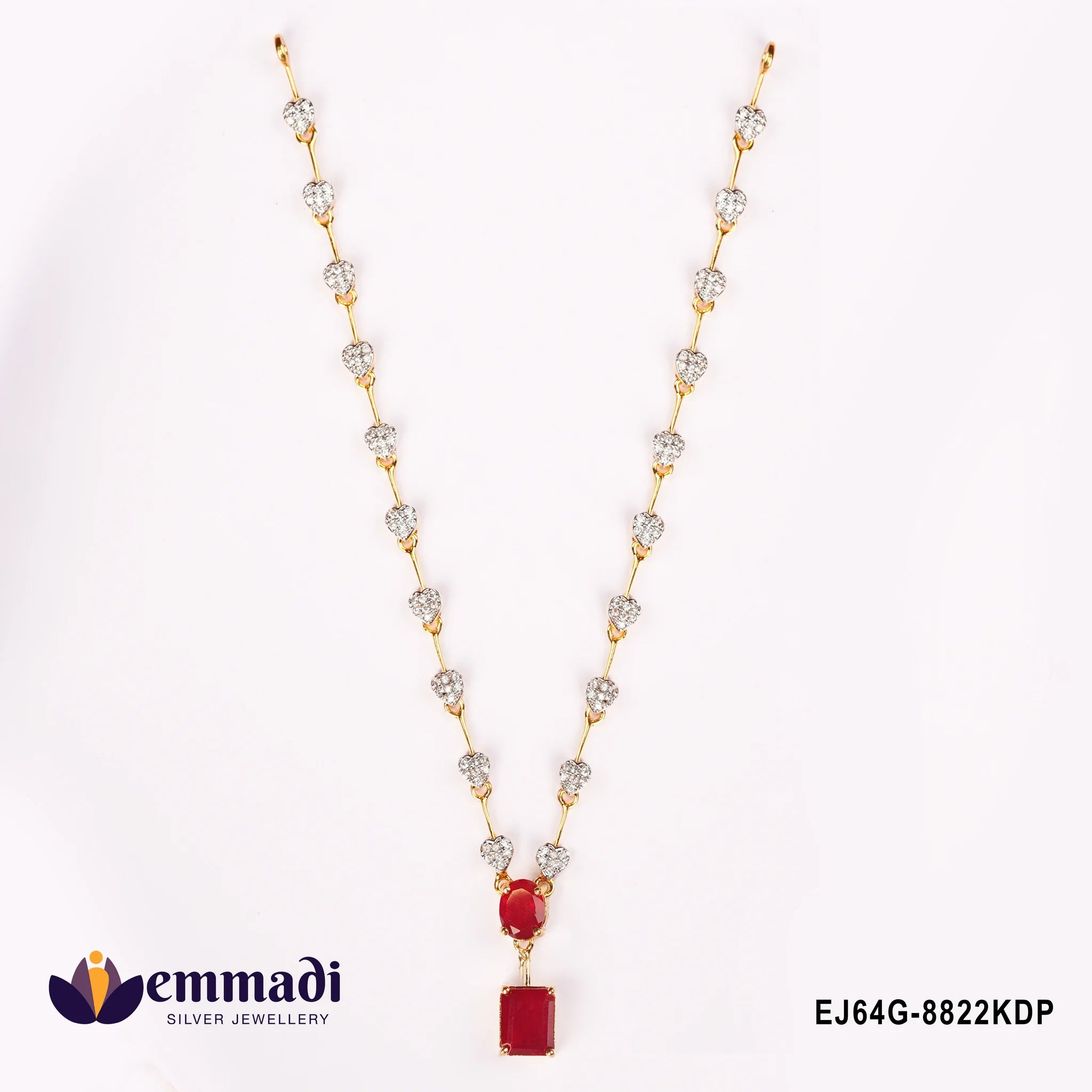 Necklace laid in V shape showing heart-shaped pave links and oval plus rectangular pink stone pendant