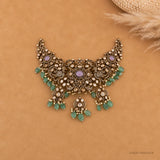 Overhead view of the antique choker necklace showing the three medallions and central pendant drop