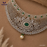 Flat lay close-up of a choker necklace highlighting cubic zirconia pave, peacock motif and pearl drop pendant