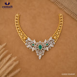 Necklace laid flat on tan fabric styled with dried grass stems, highlighting the detailed craftsmanship