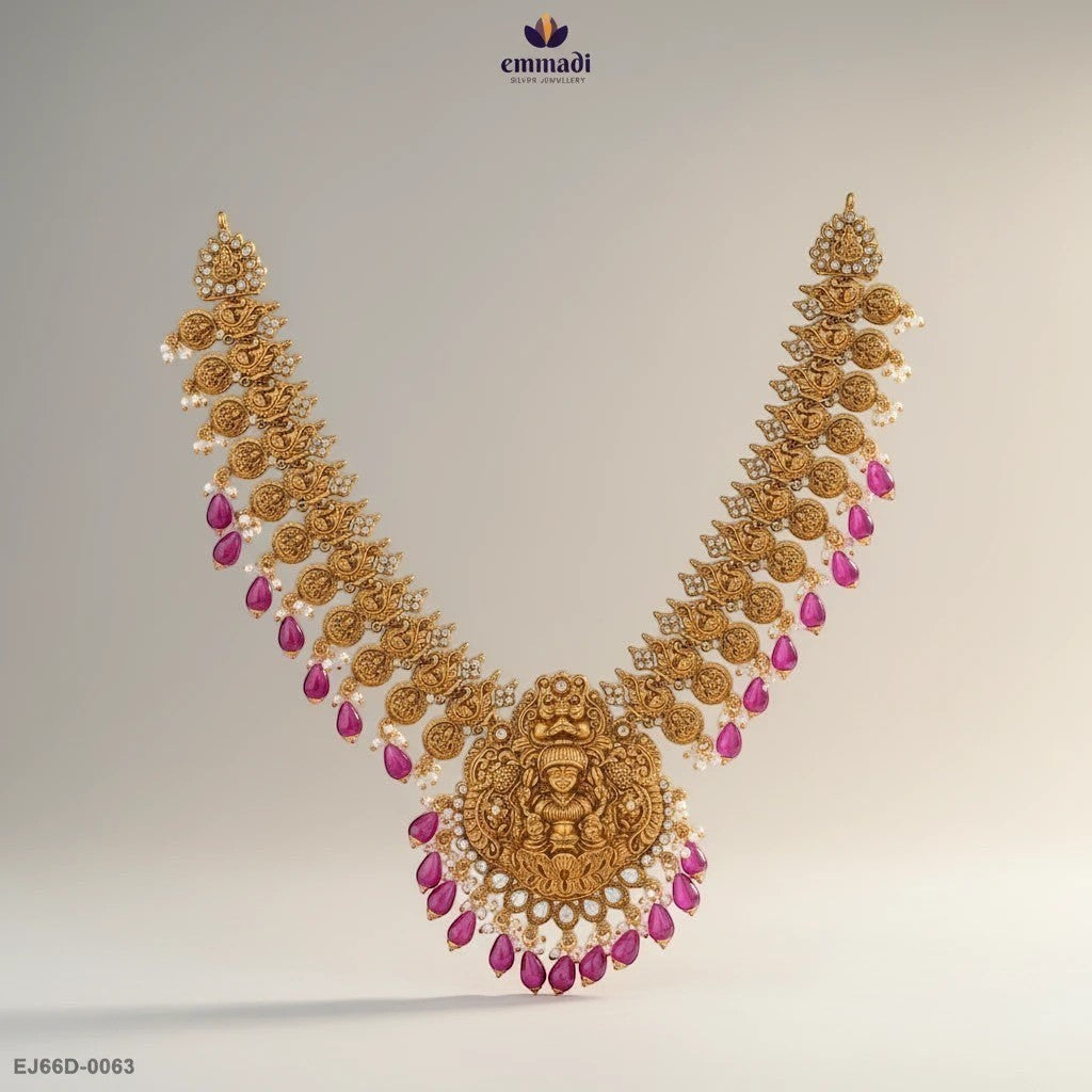 Emmadi Silver Jewellery gold nakshi necklace with intricate designs, ruby drops, and pearl accents.