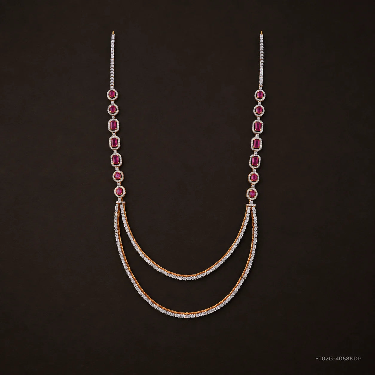 Pink and white stone long necklace with graduated gemstone straps and layered drape, shown on dark background