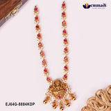 Long nakshi necklace with pink stones, cz clusters and Lakshmi pendant beside a wooden jewellery box
