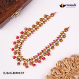 Multicolour stone necklace laid flat beside a carved wooden box, showing floral motifs and pink bead drops