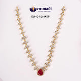 Close view of Ethika Red Necklace showing floral links and pear-shaped red pendant