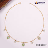 Necklace laid open showing both clasp ends with green heart pendants and round white stone charms