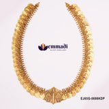 Close view of nakshi long necklace showing coin rows and peacock pendant centre on white background
