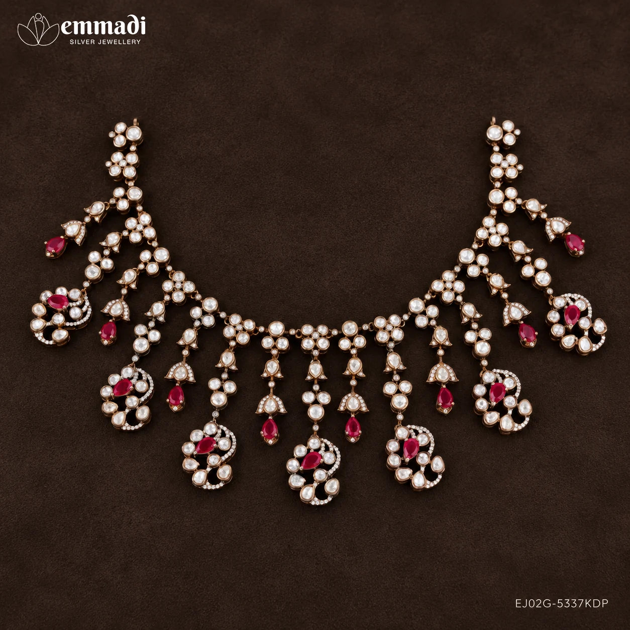 Victorian pink necklace with paisley shaped drops and antique finish on dark brown background