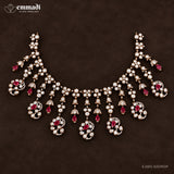 Victorian pink necklace with paisley shaped drops and antique finish on dark brown background
