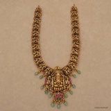 Flat lay of the full long necklace showing its U-shaped strands and detailed goddess pendant with hanging beads