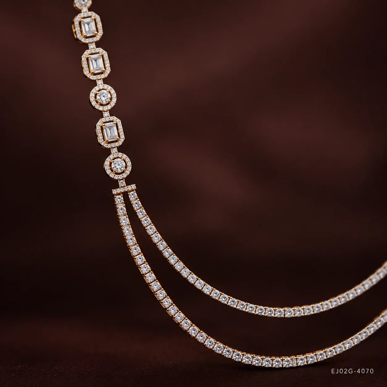Close-up of the shoulder strap showing alternating round and emerald-cut cubic zirconia in bezel settings