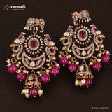 Close-up of Victorian red hangings on dark background highlighting CZ pave and jhumka drops