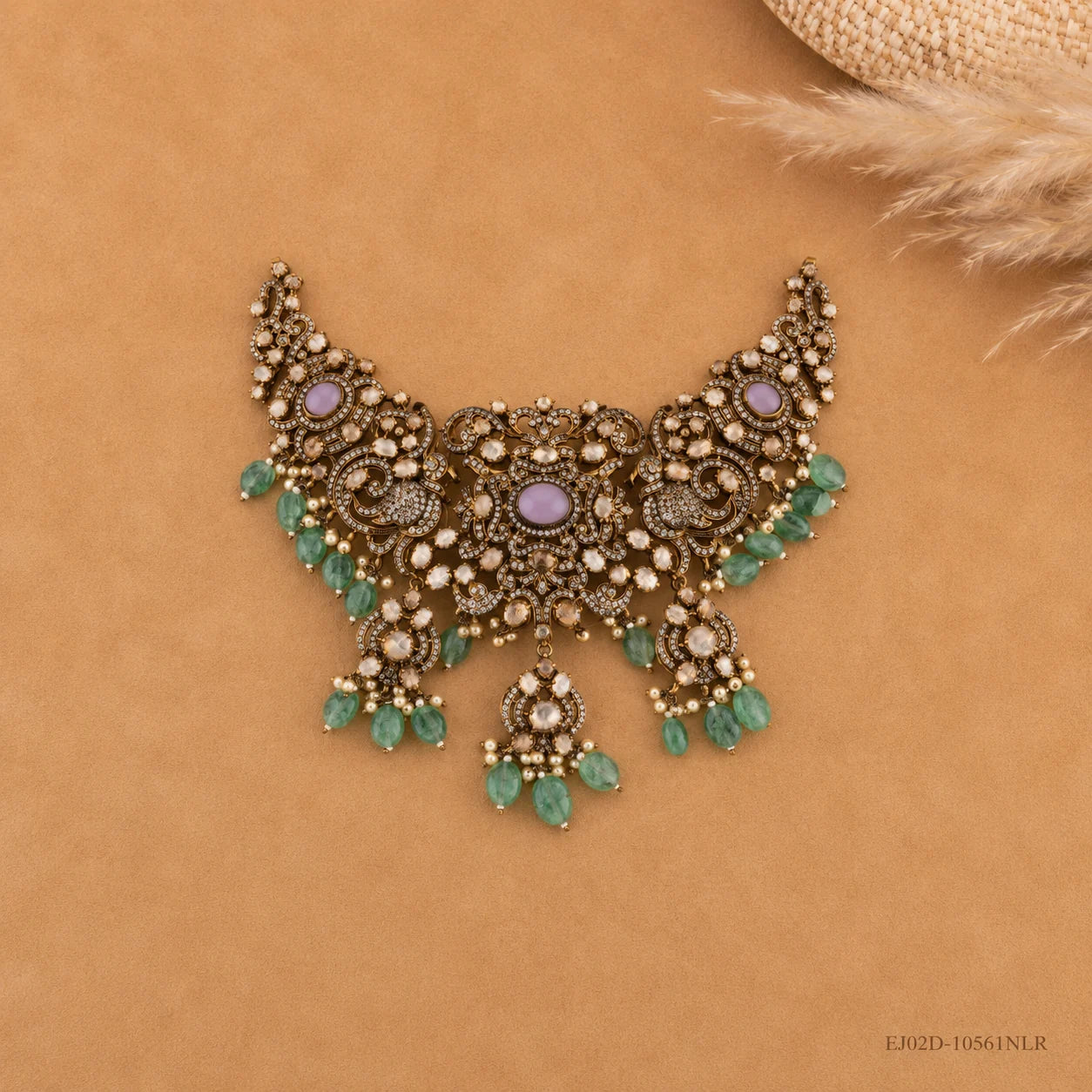 Overhead view of the antique choker necklace showing the three medallions and central pendant drop