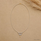 Full length view of the Ethika White Long Necklace laid out showing the complete chain and clasp