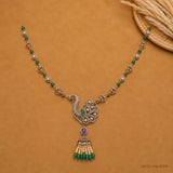 Full flat lay view of Victorian multicolour long necklace with chain, pendant and tassel detail