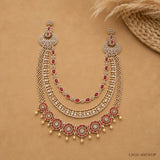 Full flat lay of red CZ long necklace displaying layered chains and symmetrical pendant drops