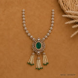 Full view of the Ira Victorian green necklace laid flat in a V shape, displaying the complete chain and pendant