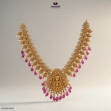 Emmadi Silver Jewellery gold nakshi necklace with intricate designs, ruby drops, and pearl accents.
